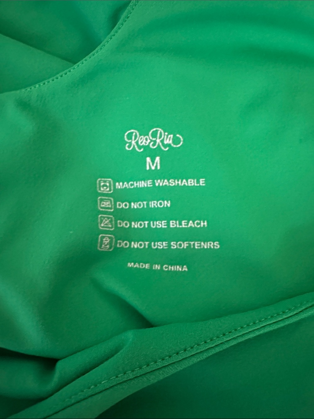 ReoRia Emerald Green Criss Cross Shoulder Bodysuit - Picture 9 of 9